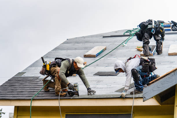 Professional Gutter Installation technician working in Pittsfield, MA